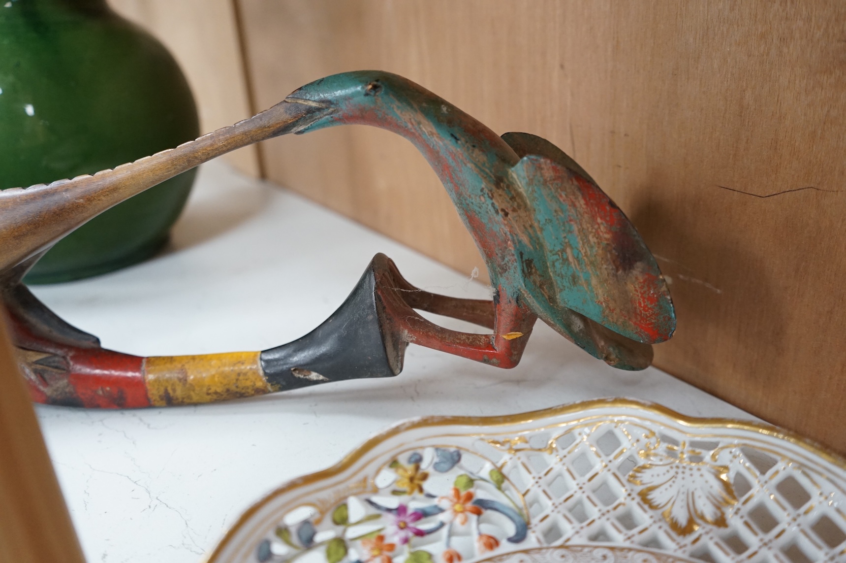 An early 20th century Tribal carved and painted mask from the Ivory Coast, 74cm in length